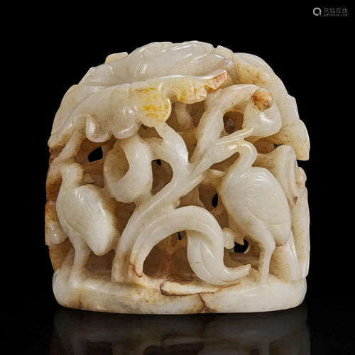 A Chinese reticulated white and russet jade finial 透雕玉炉端...