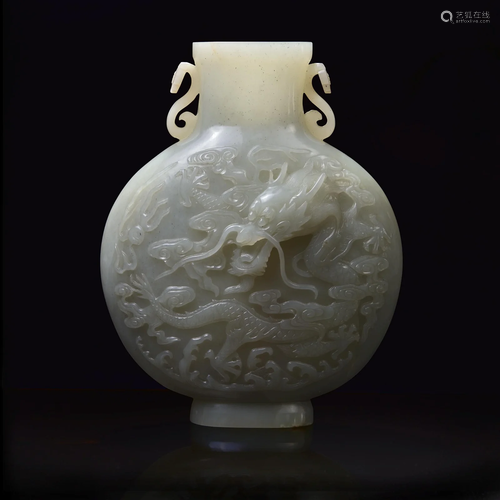 A Chinese carved celadon-grey jade "Dragon and Phoenix&...