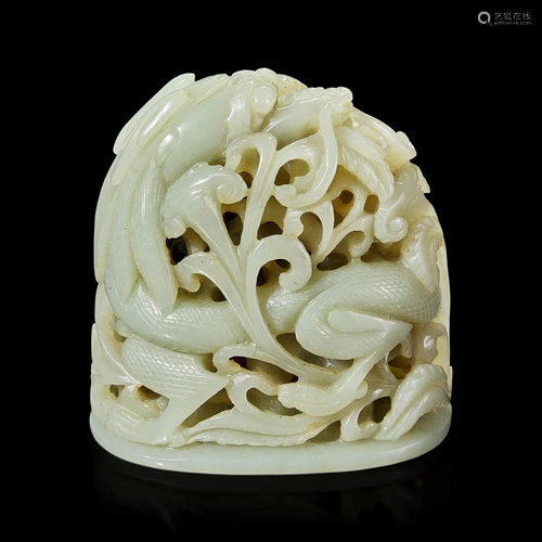 A Chinese pale celadon jade reticulated "Dragon" f...