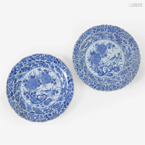 An associated pair of Chinese blue and white porcelain charg...