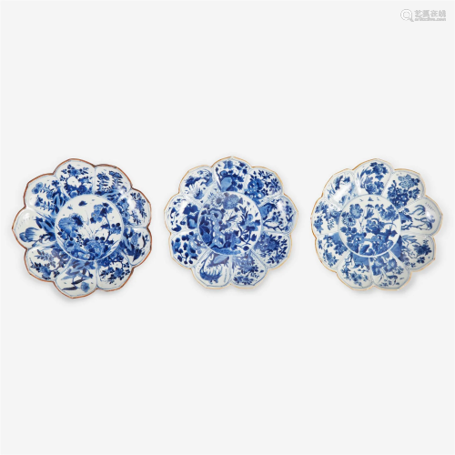 A group of three Chinese blue and white porcelain lotus-form...