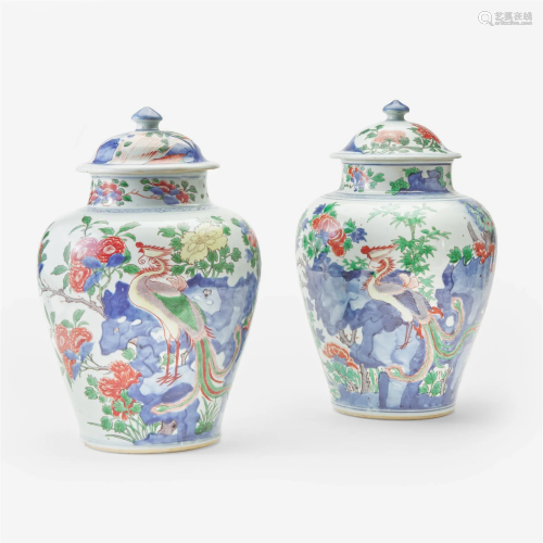 An associated pair of Chinese wucai-decorated porcelain jars...