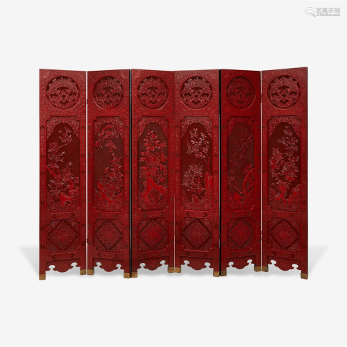 A finely-carved Chinese six-panel cinnabar lacquer wood scre...