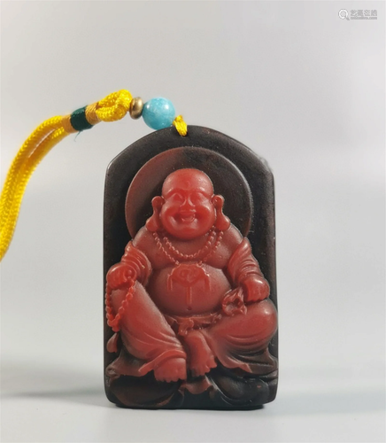 A Chinese Carved Peking Glass Pendant