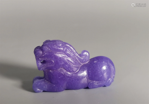 A Chinese Carved Jadeite Foo Dog Decoration