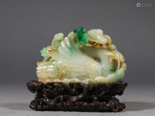 A Chinese Jadeite Decoration with Wood Base