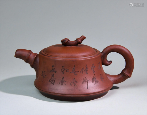 A Chinese Carved Yixing Clay Tea Pot with Lid