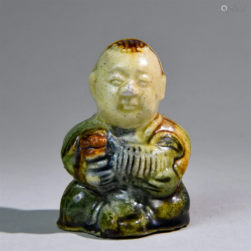 A Chinese Sancai Porcelain Decoration of Boy