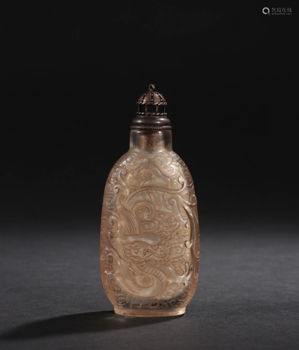 A Chinese Carved Crystal Snuff Bottle with Lid