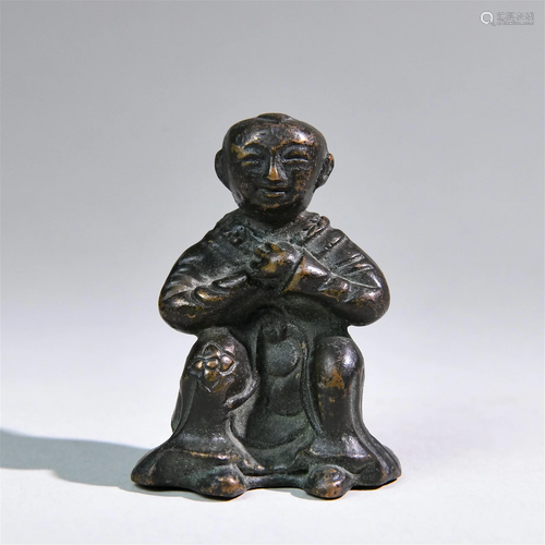 A Chinese Carved Bronze Decoration of Boy Shape