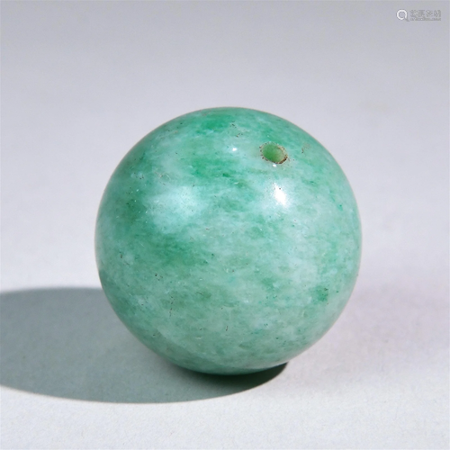 A Carved Jade Bead