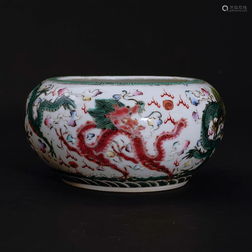 A famille rose water container with a dragon patternin the l...