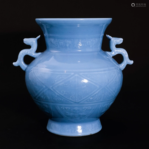 A sky blue glaze vase with two handlesin the Republic of Chi...