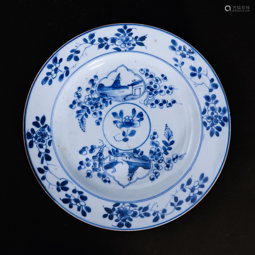 A underglaze blue plate in the Kangxi period of the Qing Dyn...