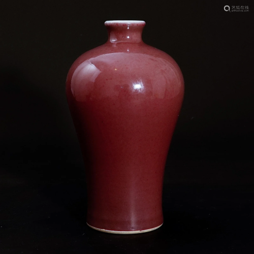 A red glaze vase in Qing Dynasty