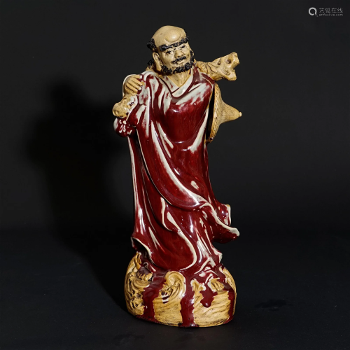 A red glaze statue in Qing Dynasty