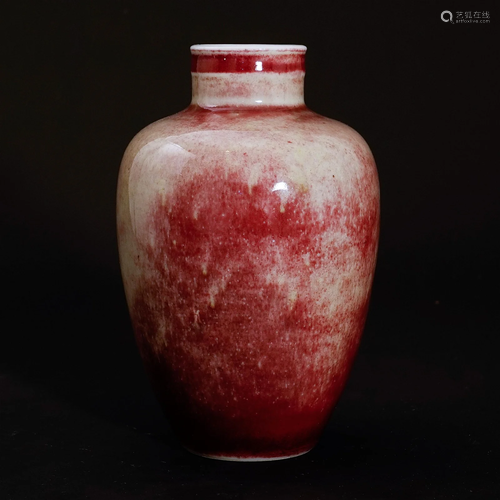 A red glaze vase in Qing Dynasty