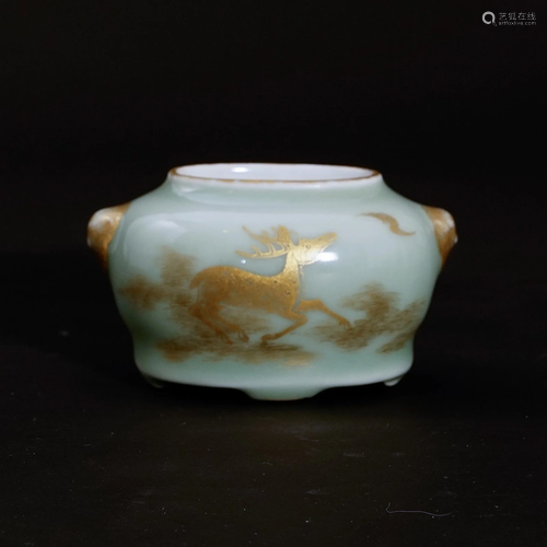 A green glaze water container with painted goldin the Qianlo...