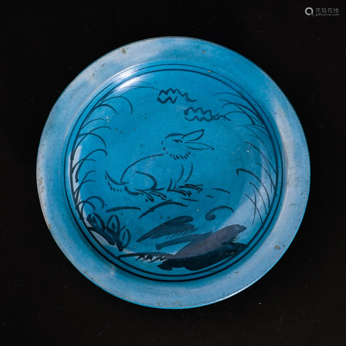 A peacock blue glaze plate in Yuan Dynasty