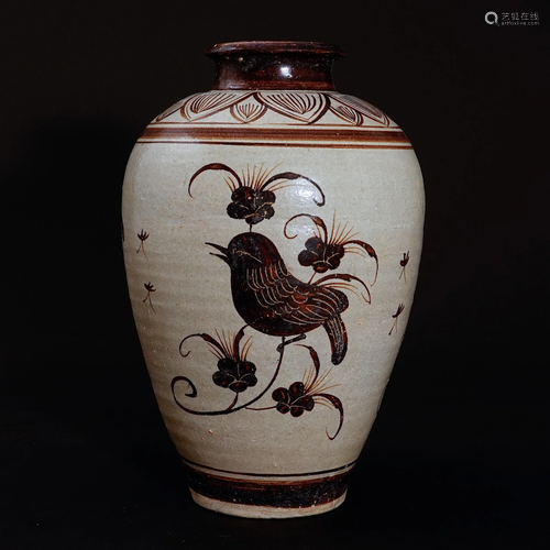 A vase from Jizhou warewith a flower and bird patternin Song...