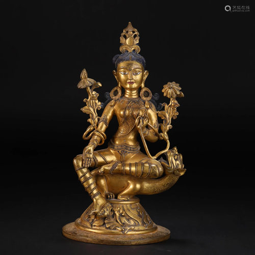 A Tibetan Bronze-gilt Figure of Green Tara