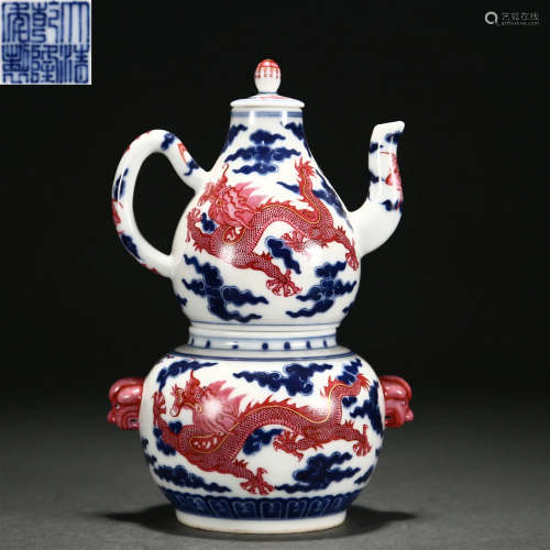 A Chinese Underglaze Blue and Iron Red Ewer