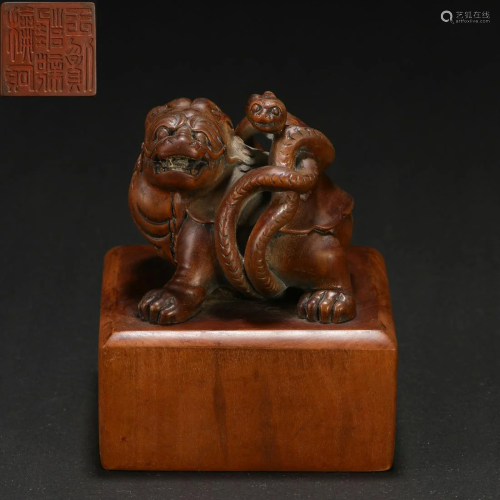 A Chinese Carved Wooden Beast Seal