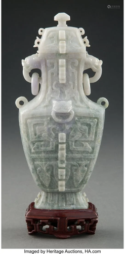 A Chinese Carved Jadeite Urn 7-1/4 x 3-1/2 x 2 i