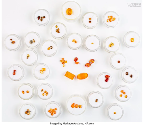 A Group of Seventy-Six Various Orange Gemstones