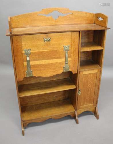 ARTS & CRAFTS OAK BUREAU a large oak bureau with stylise...