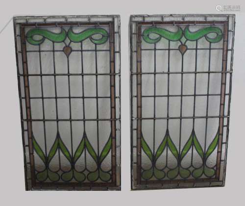 PAIR OF LEADED STAINED GLASS PANELS of rectangular shape wit...