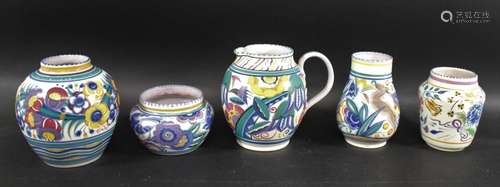 POOLE POTTERY including a jug painted with flowers and folia...