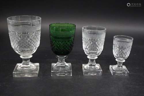 SUITE OF TABLE GLASS a suite of hob nail cut glasses with sq...