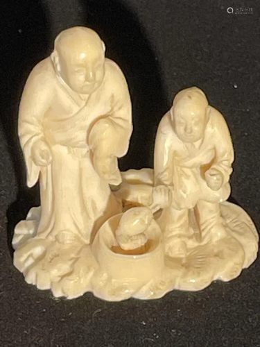 An Old Japanese Carved-Bone Figural Ornament