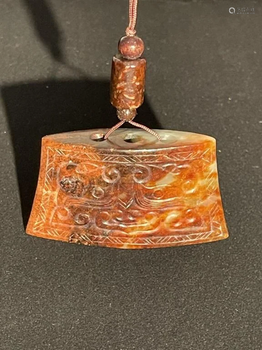 An Old Carved Jade Pendant