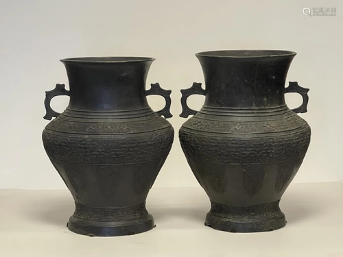 A Qing Dynasty Pair of Carved Bronze Vases