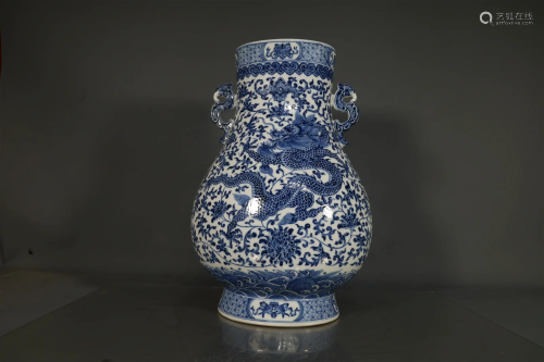 A Blue And White 'Dragon' Zun-Form Vase