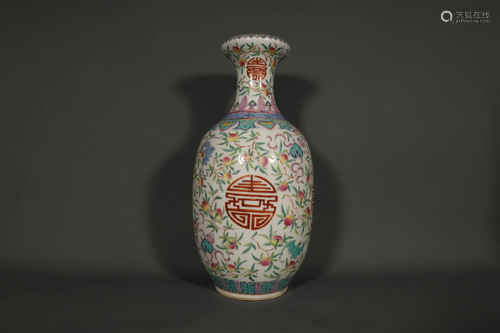 A Fine Famille Rose Longevity Peach Vase