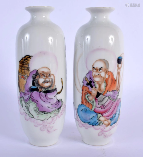 A PAIR OF CHINESE FAMILLE ROSE PORCELAIN VASES 20th Century....