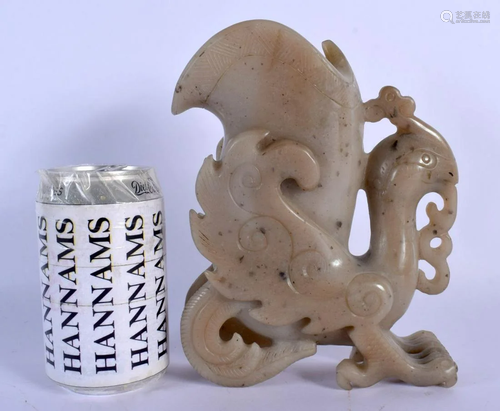 A RARE EARLY 20TH CENTURY CHINESE CARVED JADE RHYTON LIBATIO...