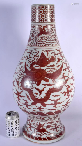 A VERY LARGE CHINESE IRON RED PAINTED BALUSTER VASE probably...