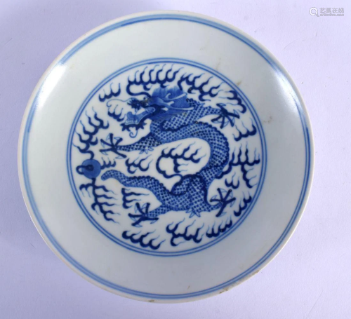 A CHINESE BLUE AND WHITE PORCELAIN DRAGON DISH 20th Century,...