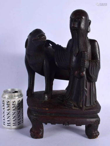 A RARE EARLY CHINESE CARVED WOOD FIGURE OF A HORSE modelled ...