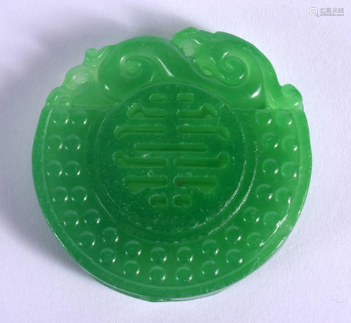 A CHINESE APPLE JADE CIRCULAR ROUNDEL PENDANT 20th Century. ...