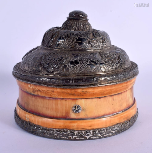 A 19TH CENTURY TIBETAN SILVER AND IVORY BOX AND COVER decora...