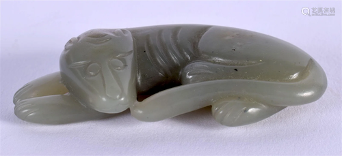 A 19TH CENTURY CHINESE CARVED GREEN JADE FIGURE OF A SLENDER...