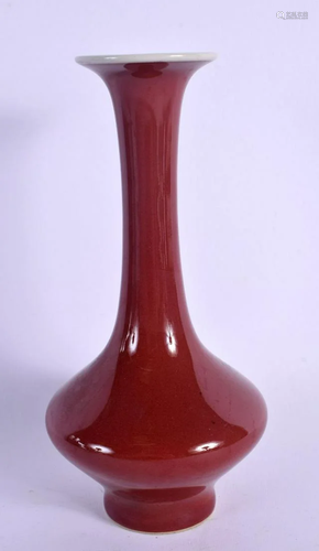 A CHINESE RED GLAZE FLAMBE GLAZED VASE of bulbous form. 17 c...