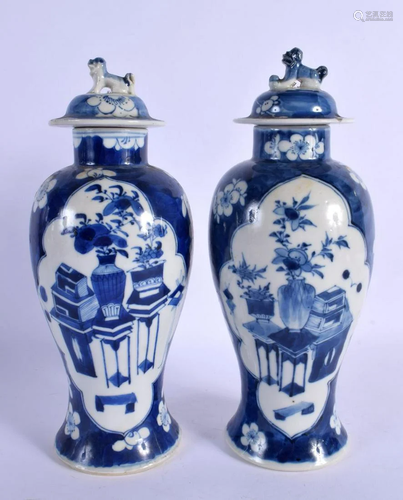 A PAIR OF 19TH CENTURY CHINESE BLUE AND WHITE PORCELAIN VASE...