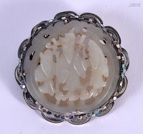 AN EARLY 20TH CENTURY CHINESE CARVED GREENISH JADE SILVER AN...