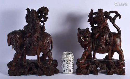 A RARE LARGE PAIR OF 19TH CENTURY CHINESE CARVED HARDWOOD FI...